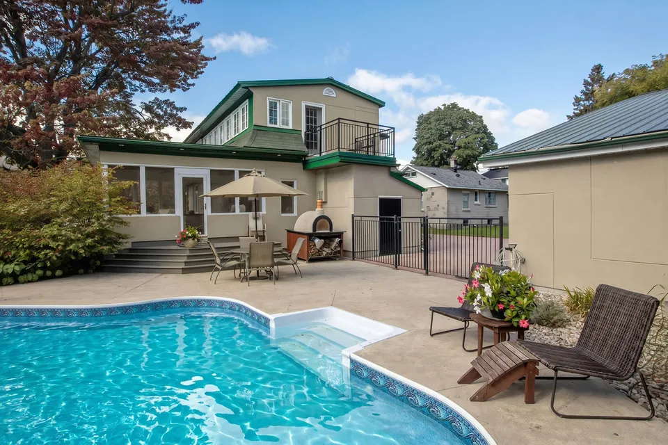 AI-retouched backyard with pool