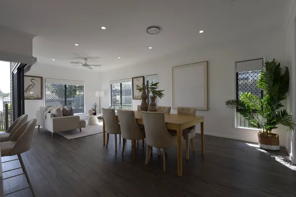 The middle bracket as the camera metered it: the room dim, the windows bright